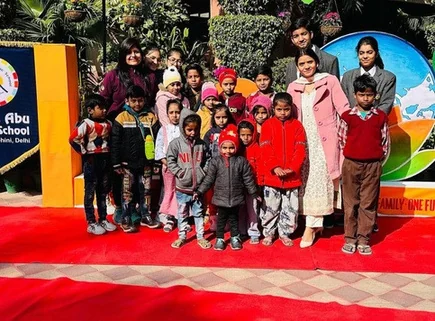 Children and volunteers during a community celebration