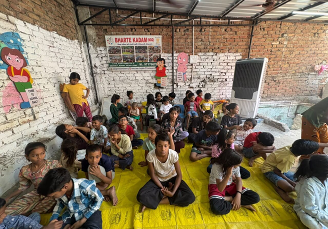 Children gathering in the improved covered learning space supported through the Dextra Group CSR collaboration