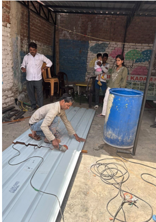 Roof sheets being installed at the learning centre