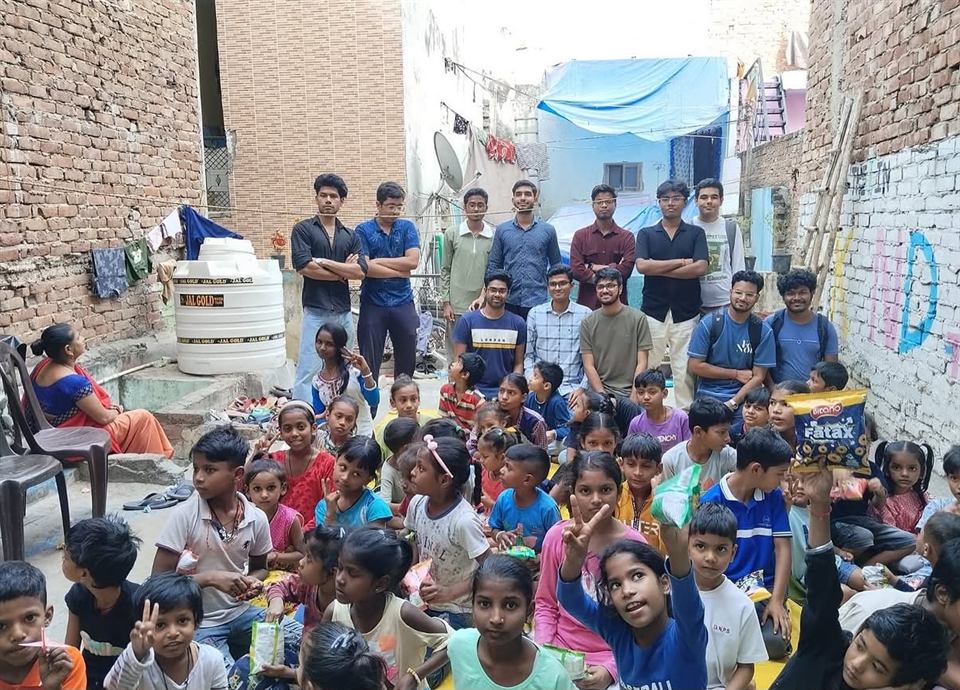 BKF volunteers with children during a community support activity